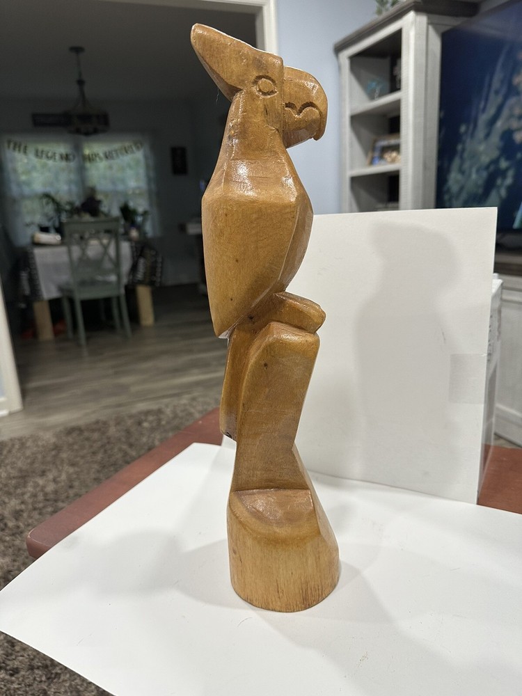 carved wooden parrot