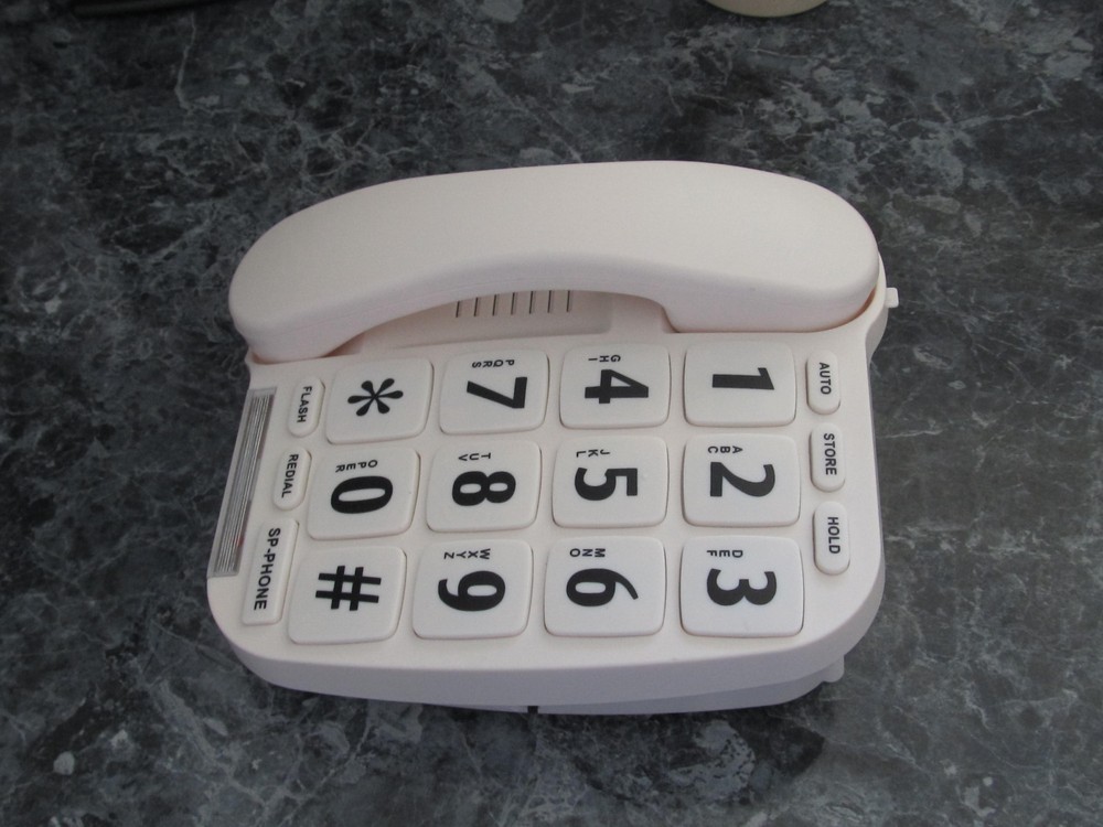 EXTRA LARGE BUTTON TELEPHONE WITH VOICE AMPLIFICATION