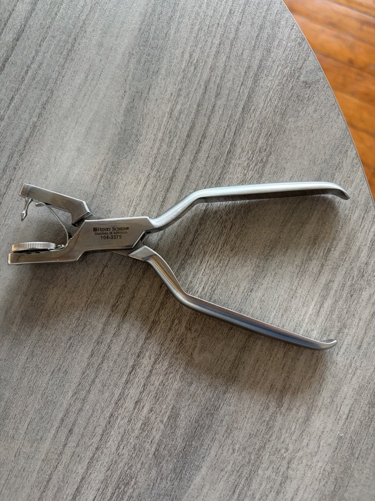 Henry Schein Rubber Dam Hole Punch