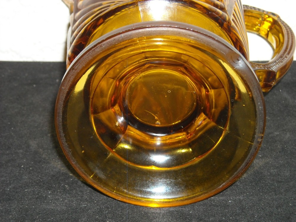 Jubilee / Isis Pattern Water Pitcher Amber
