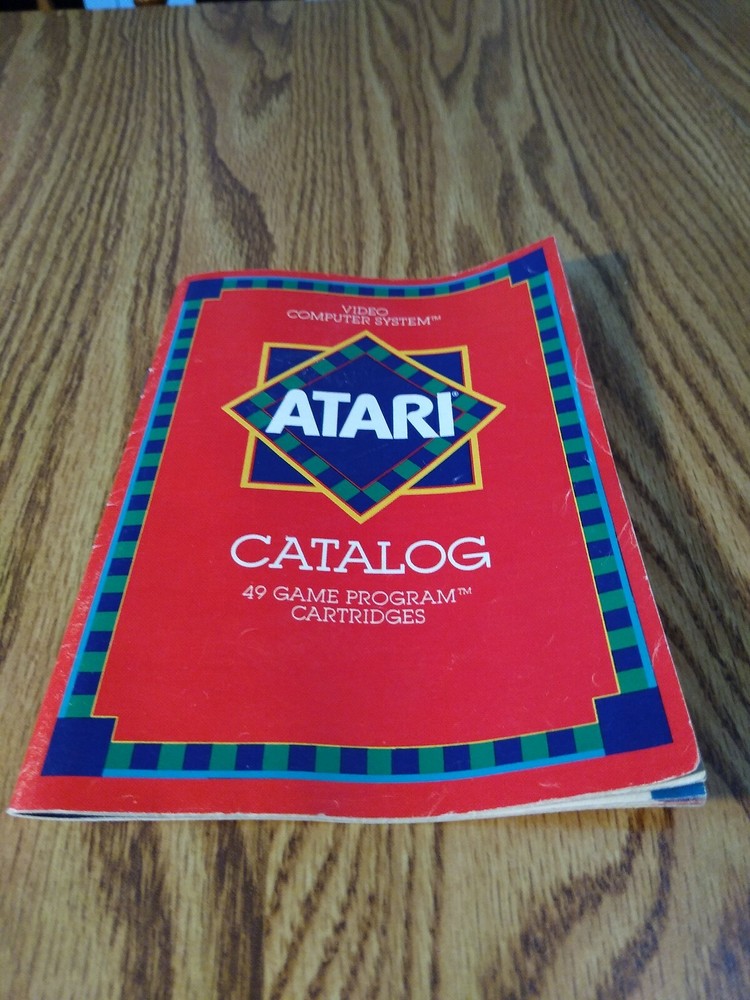 Atari 2600 Video Computer System Catalog 49 Games 1982 Vintage Original