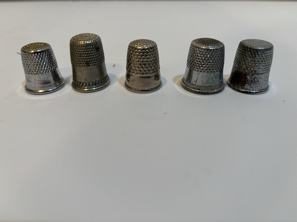 Five thimbles. Sizes 8, 9, 9,10,11
