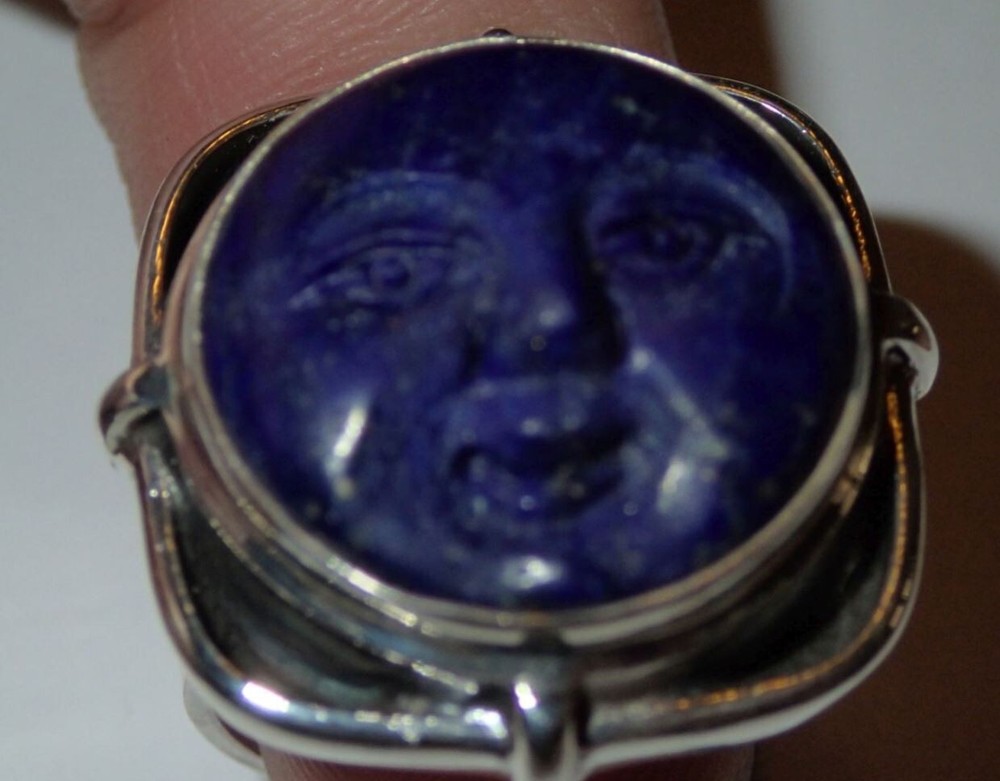 Sterling Silver Ring with Lapis carved Face. adjustable