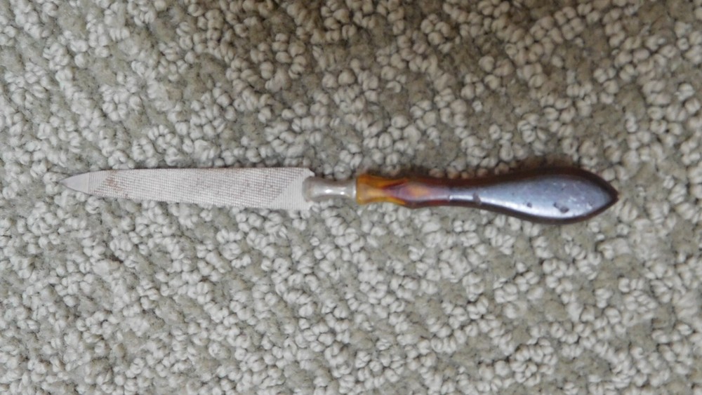Vintage brown "tortoise shell" Celluloid Nail File