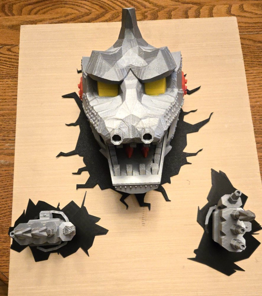 $REDUCED-READ DESCRIPTION   1974 Mechagodzilla Head -  multicolored wall art set