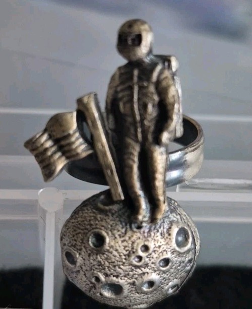 Unique statement Adjustable ring featuring an Astronaut standing on The Moon
