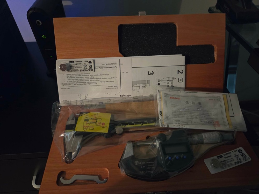 Mitutoyo caliper micrometer set With wood case.