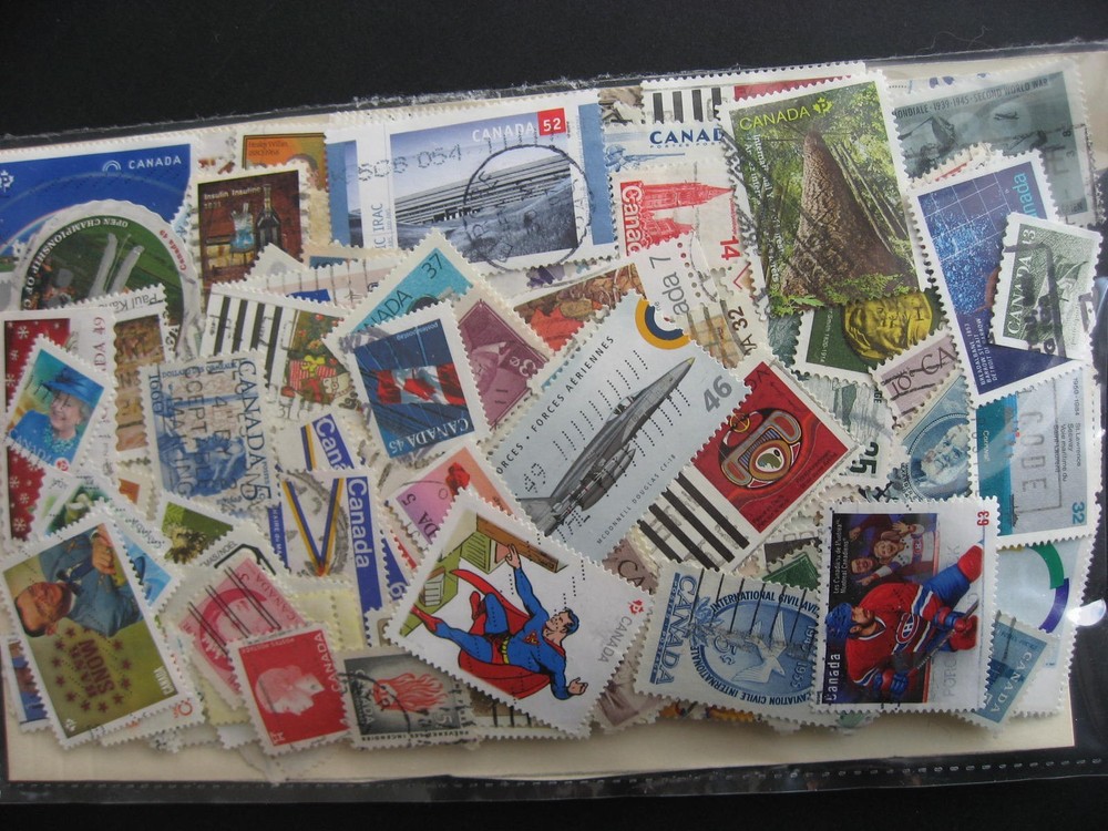 Canada colossal mixture (duplicates, mixed cond) 10000 35% comems, 65% defins