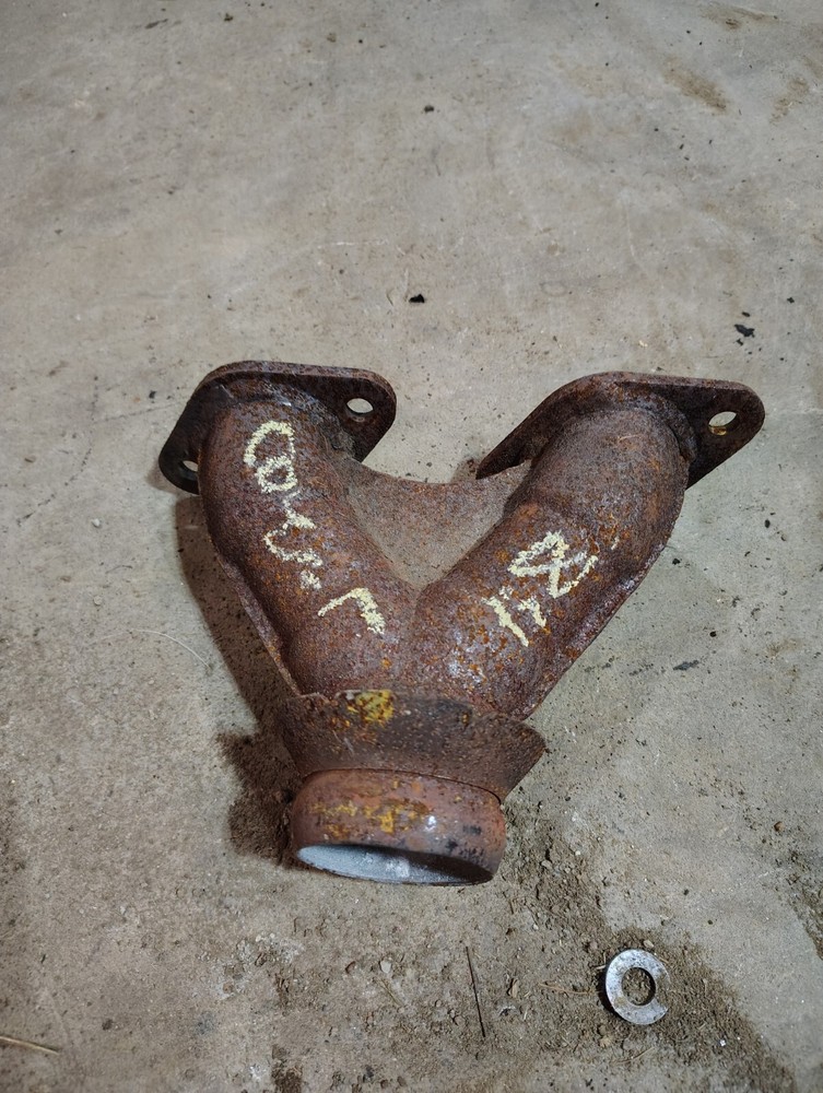 1989 Arctic cougar exhaust manifold