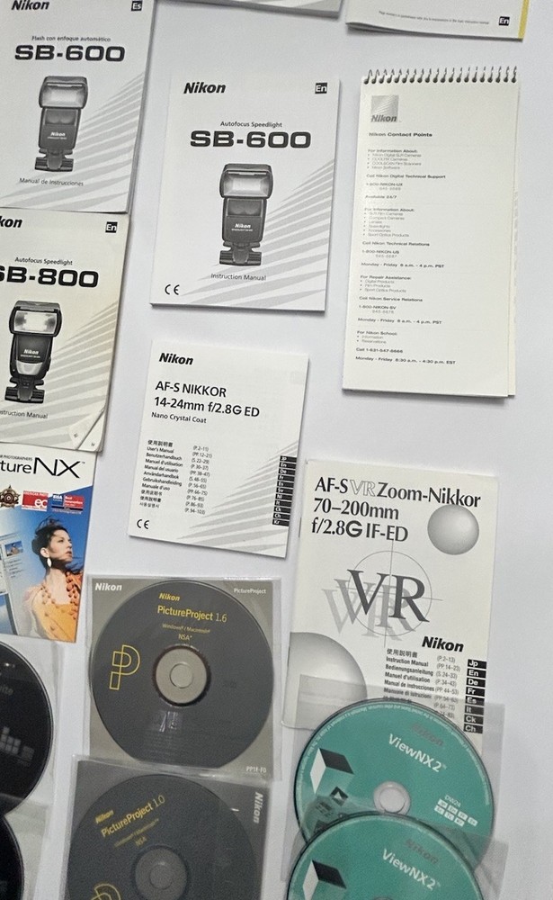 Nikon Camera Lot of Discs & User’s Manuals