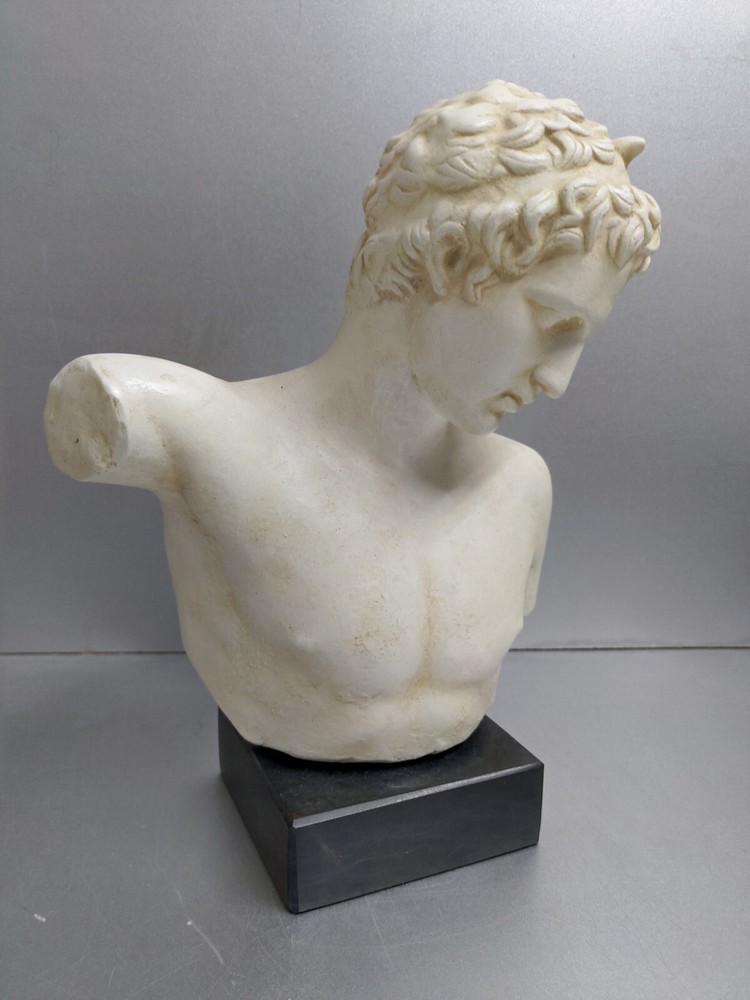 Ephebe bust sculpture on black marble base