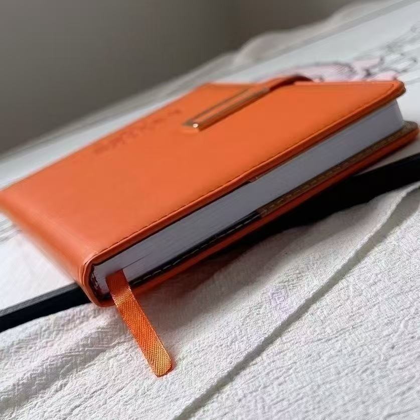 VIP Orange Notebook With Pen GWP