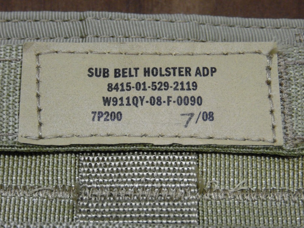 Sub Belt Holster Adapter USGI MOLLE Khaki Resource Center NOS