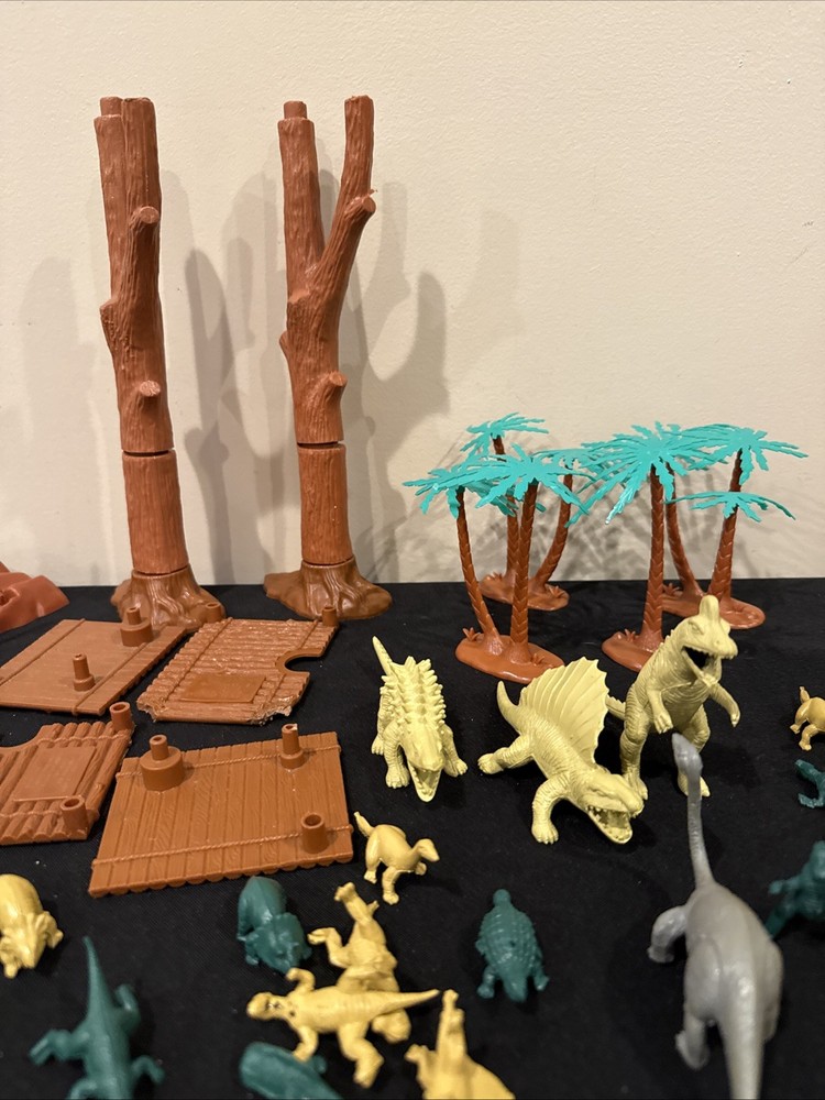 Dinosaur Approximately 37 Figures Plus Trees ( Missing Parts) READ