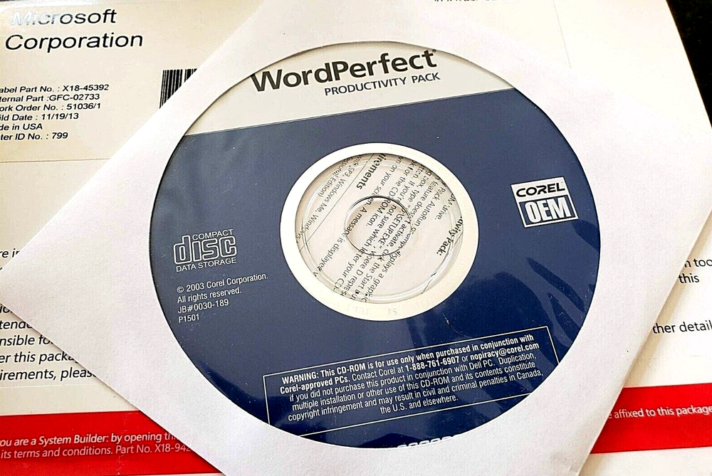 Assorted Software CDs & Logitech Manual (Windows 7, Word Perfect & Linksys)