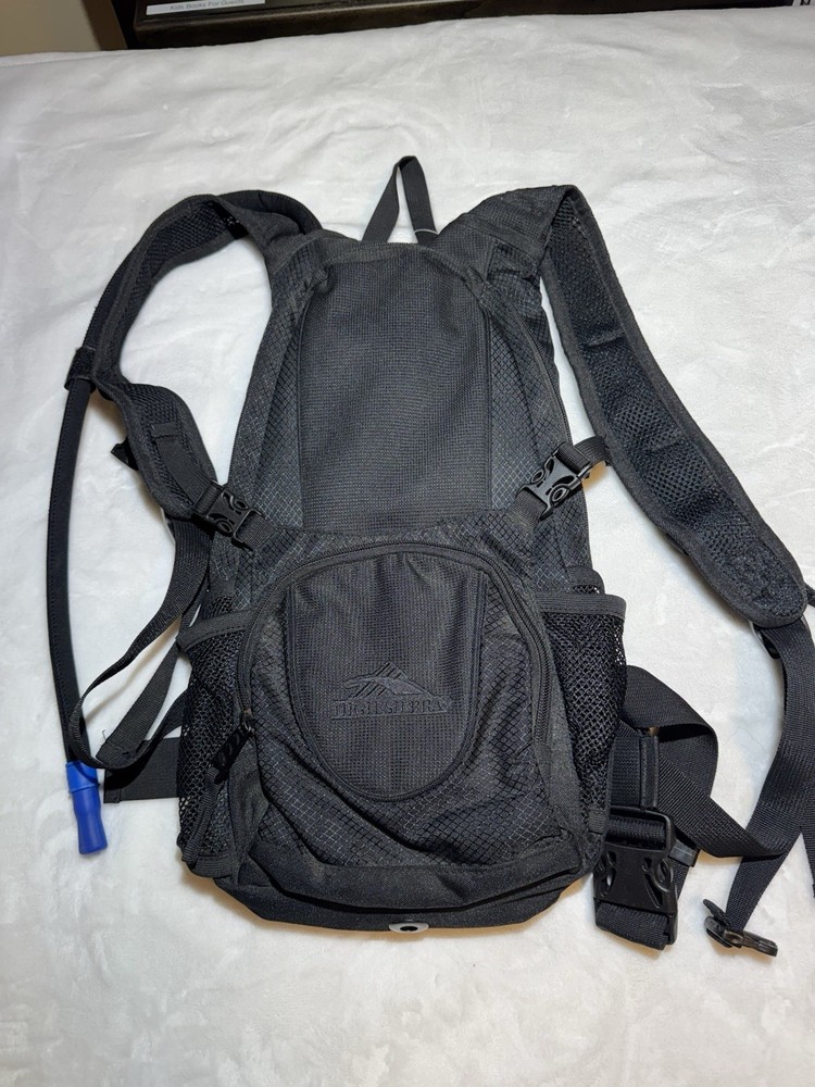 High Sierra- Drench Hydration Pack/ Backpack. Holds 2 Liters. New!