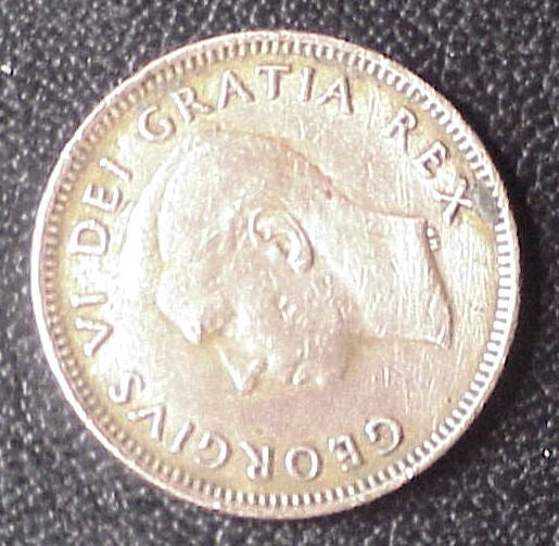 Circ. 1949 Canada King Geo. VI "A" between dent. (lightly cleaned?)