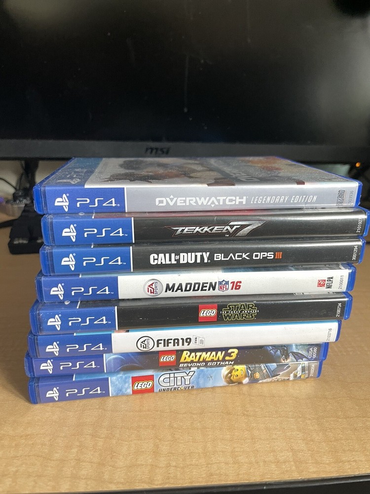 ps4 console 2 controllers and games