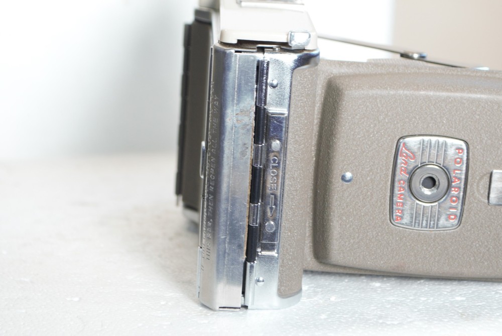 Polaroid Land Camera Model 8oA Wink Light Light Reducer & leather case