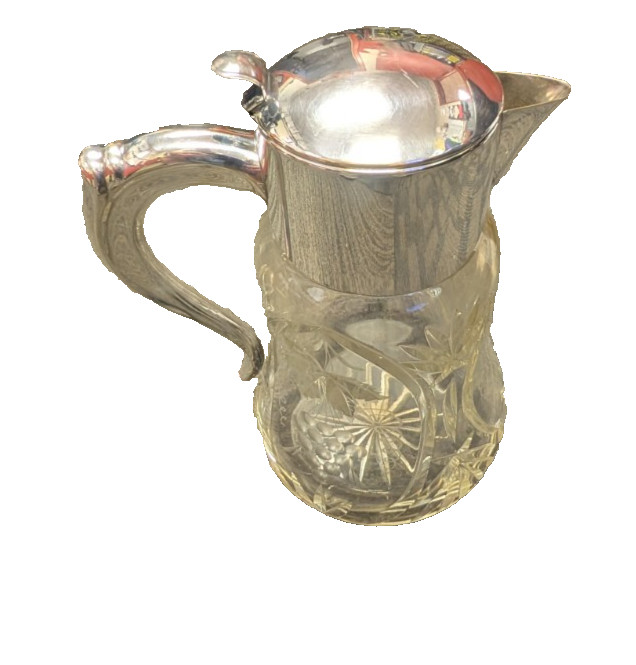 Crystal Pitcher With a Silver Plated Metal