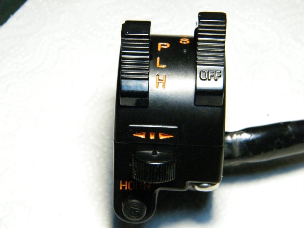 Laverda 750 headlight on/off switch contact shuttle.