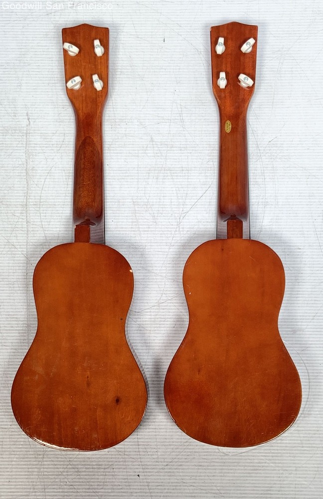 2 Universal Worldwide Trading Inc 4-String Soprano Ukuleles