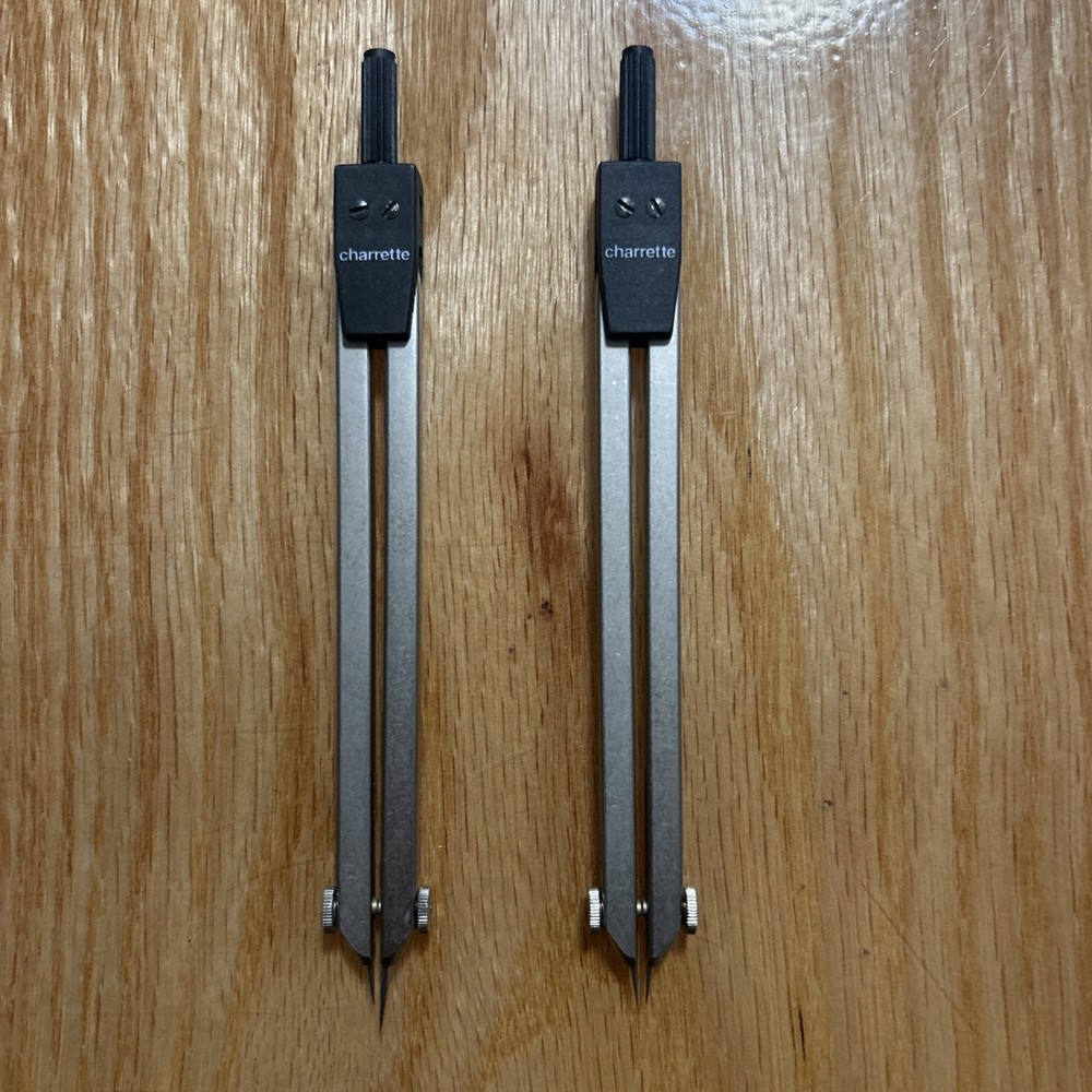 Lot of four drafting compasses