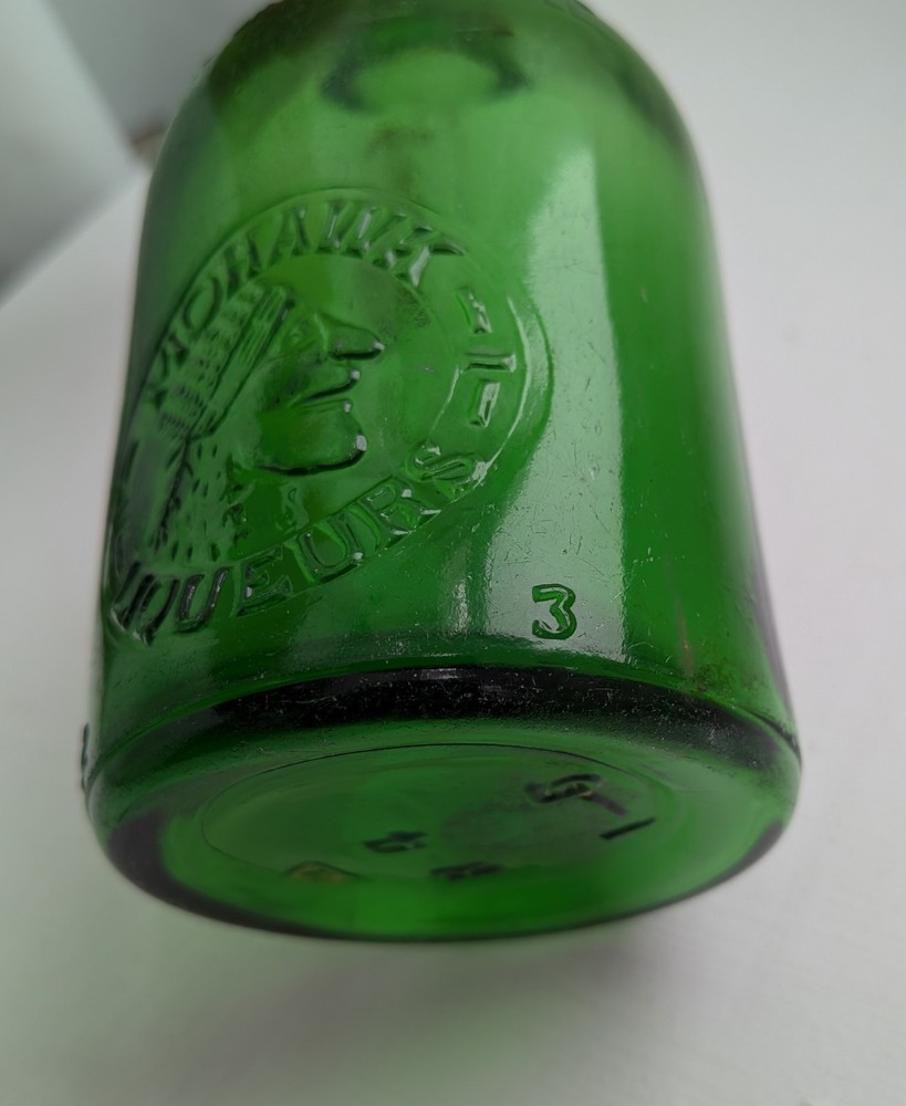 Vintage Mohawk Liqueurs green Bottle