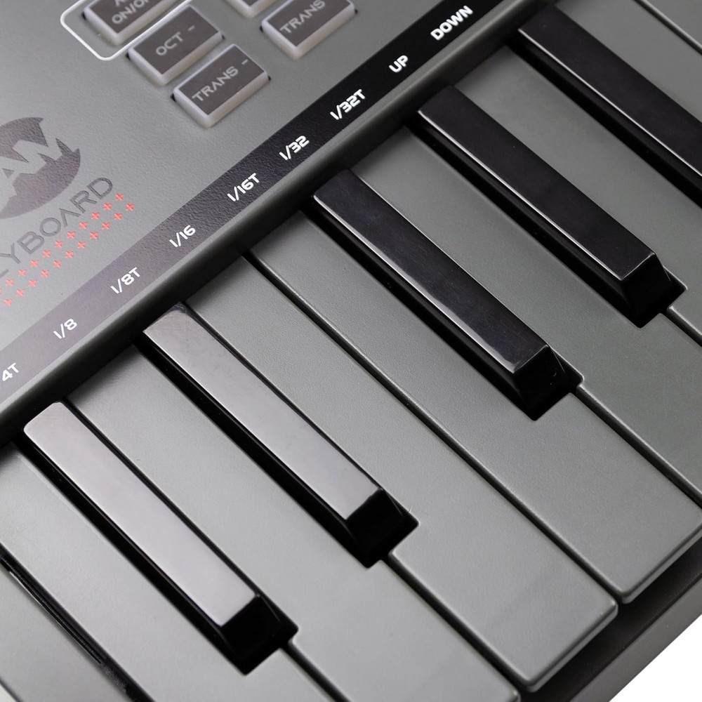 , Go 25 Key USB and Bluetooth MIDI Keyboard Controller with 8 Backlit Drum Pads,