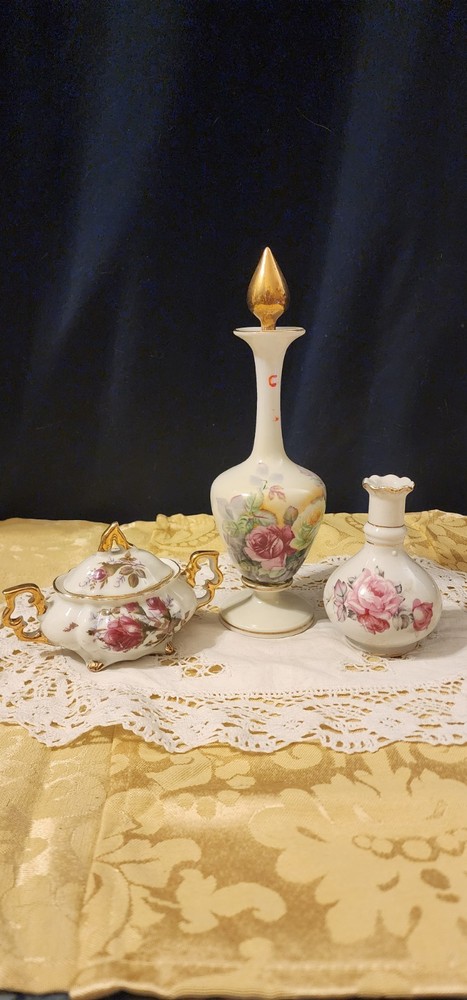 Three Beautiful Rose Motiff Vases