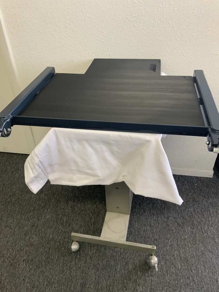 Ophthalmic Chair mover.  TOPCON
