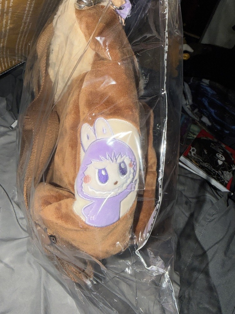 The Monsters Fuzzy Backpack