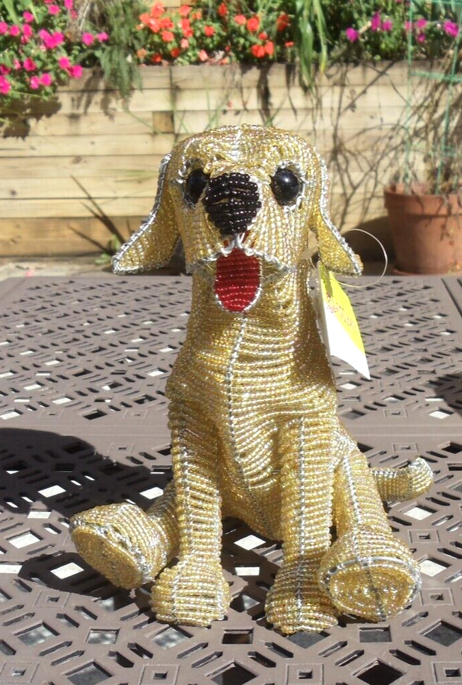 Beaded land:  Yellow lab puppy