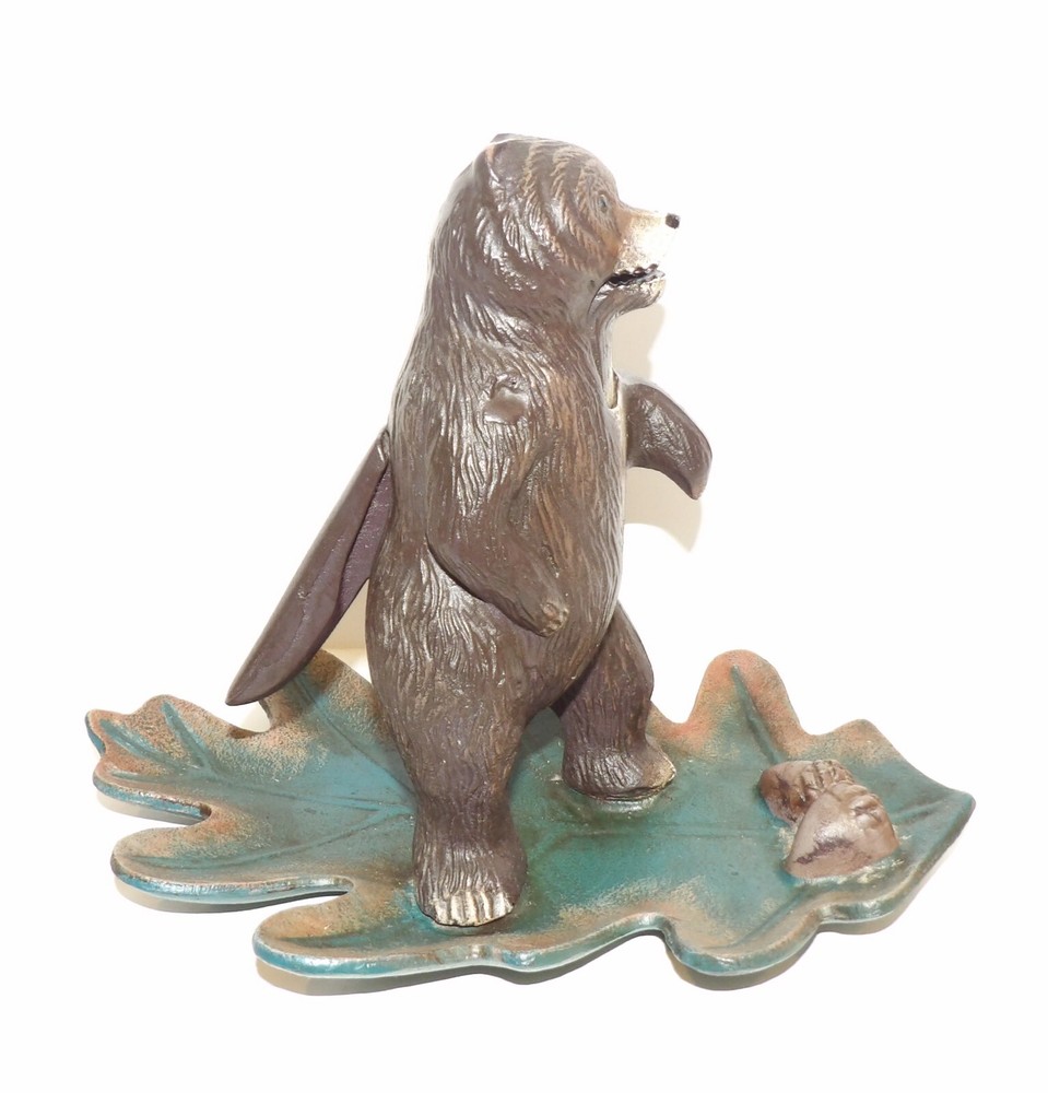 WONDERFUL M.I. CAST IRON BEAR STANDING ON LEAF NUTCRACKER