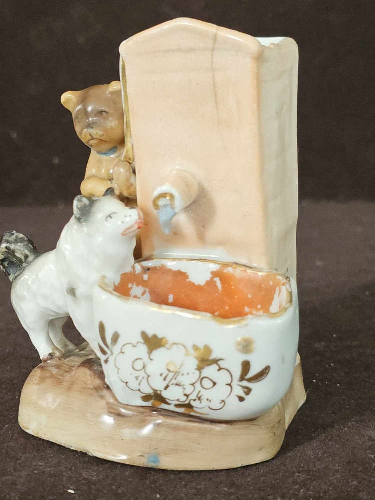 Antique Dog Pumping Water & Drinking Water Match Strike