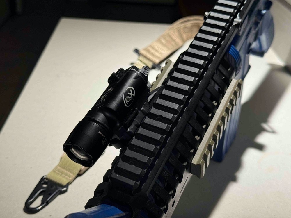 Ring's Blue Gun Training Replica Accessorized: VLTOR/Surefire/DanielDefense/GGG