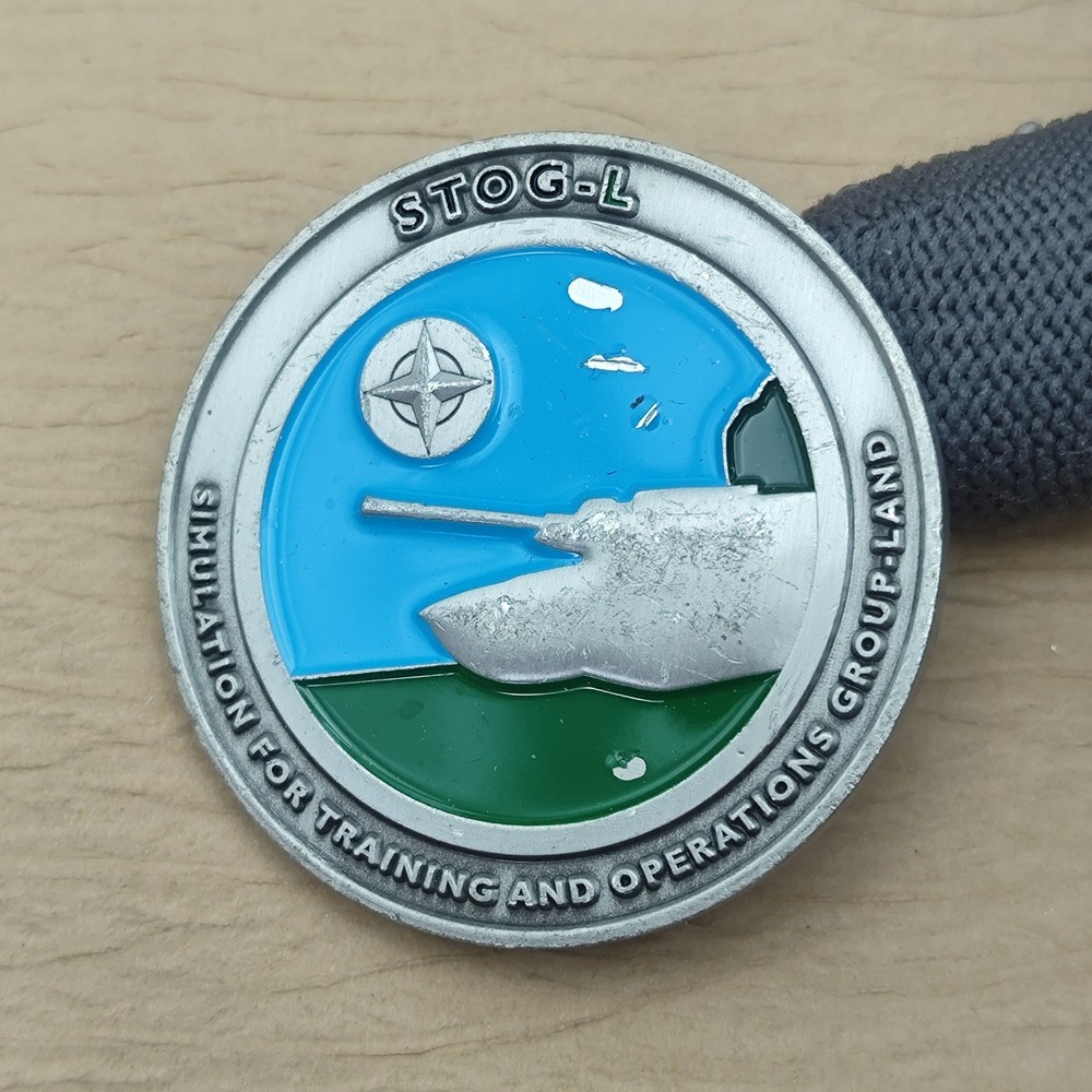 Simulation for Training and Operations Group-Land Challenge Coin