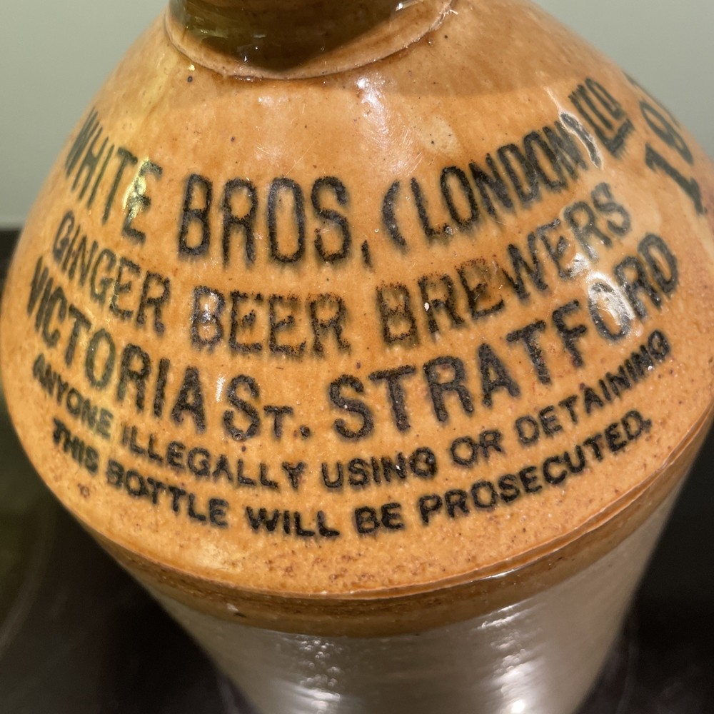 stoneware flagon. White Bros. Ginger Beer. Broken Handle