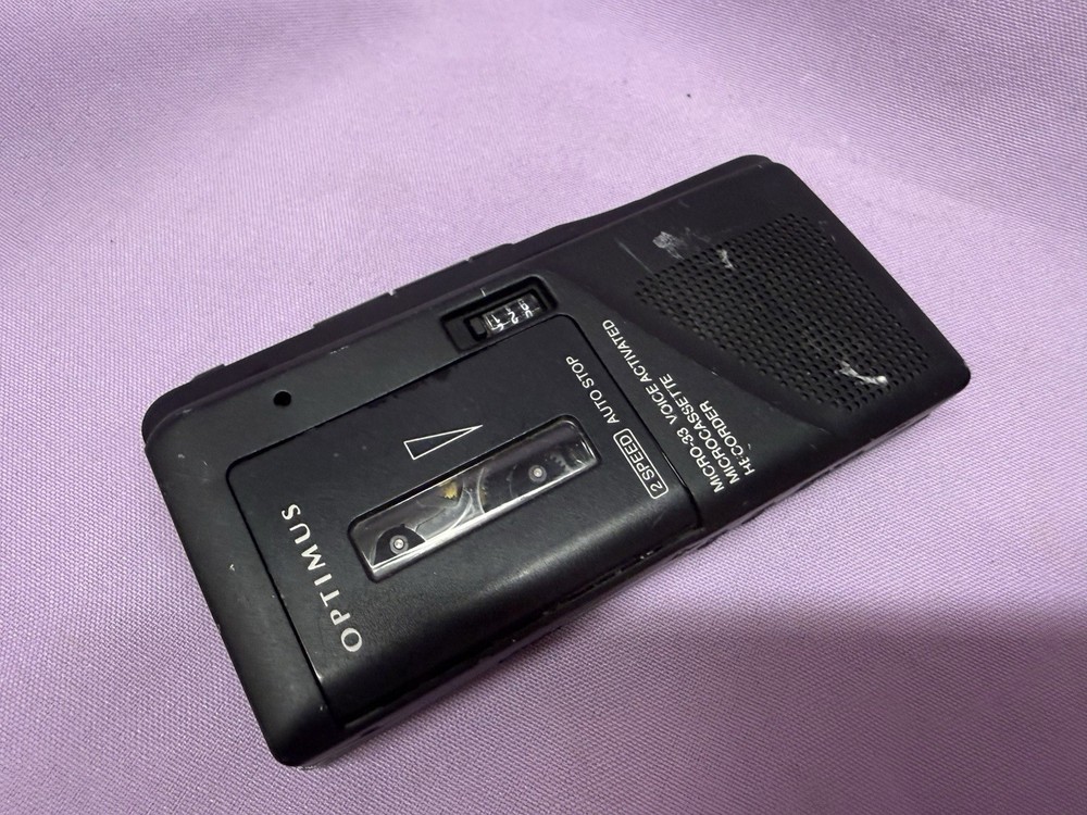 Optimus Micro-33 Voice Activated Microcassette Recorder. Not Tested.