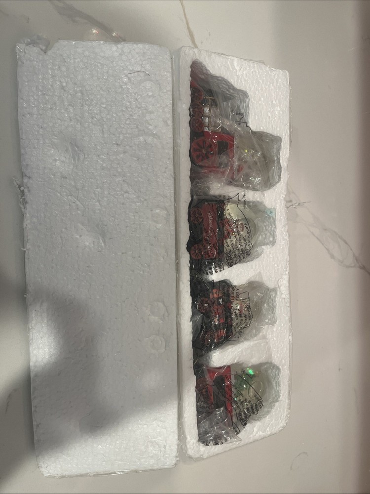 F.A.O SCHWARZ 4- piece Train Snow Globe Set