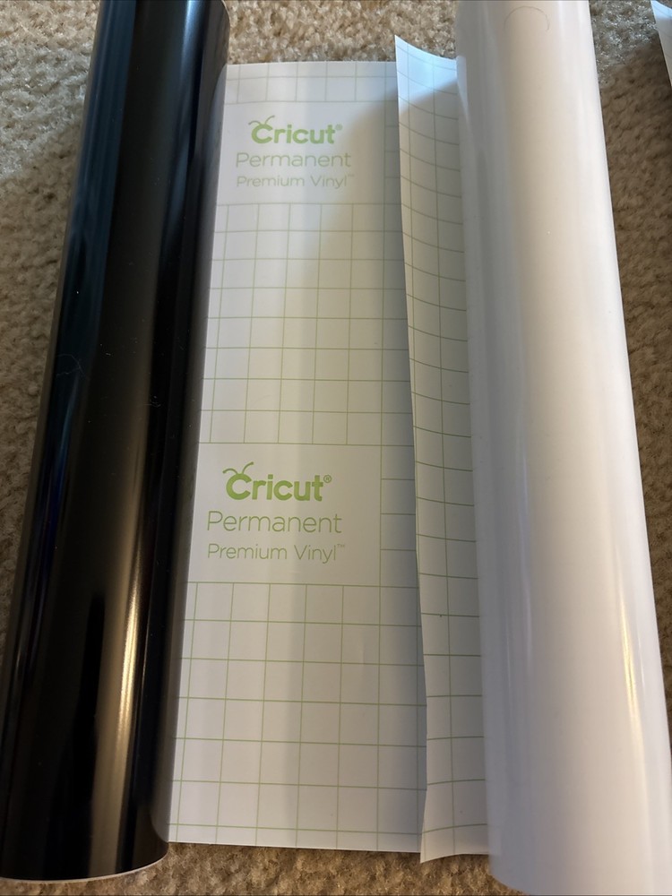 Cricut vinyl rolls- 2 White & 2 Black