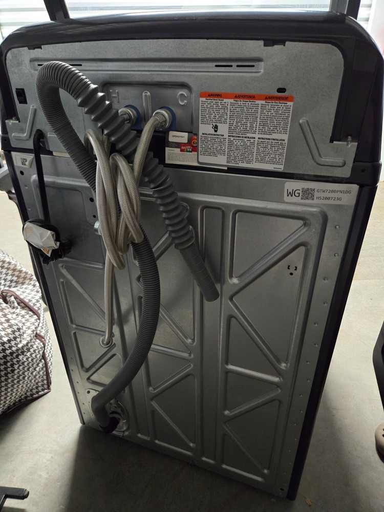 GE top load washer and dryer combination. Lightly used.