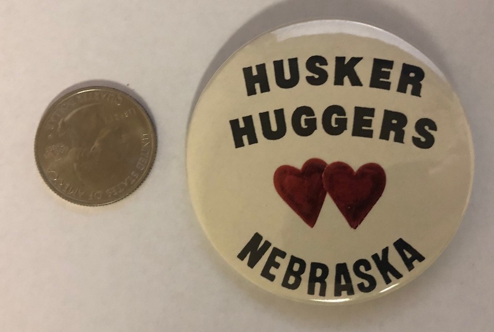 Husker Huggers Nebraska Button Pin