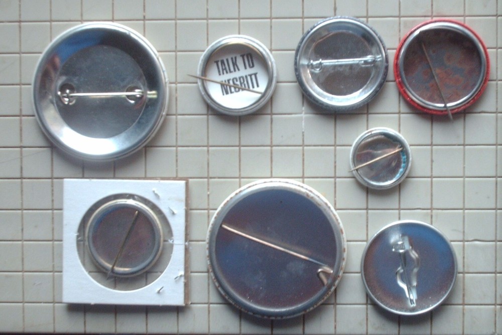 Eight 60’s 70’s  Protest Pinback Buttons