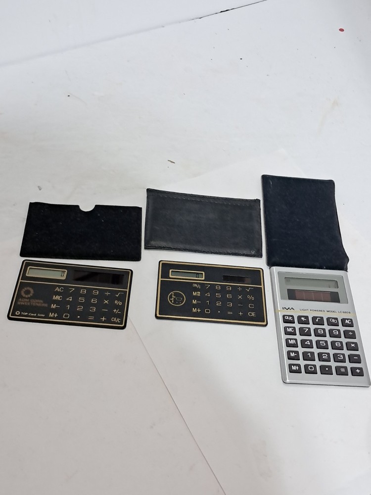 3-Vintage Solar Powered Calculators With Cases (e)