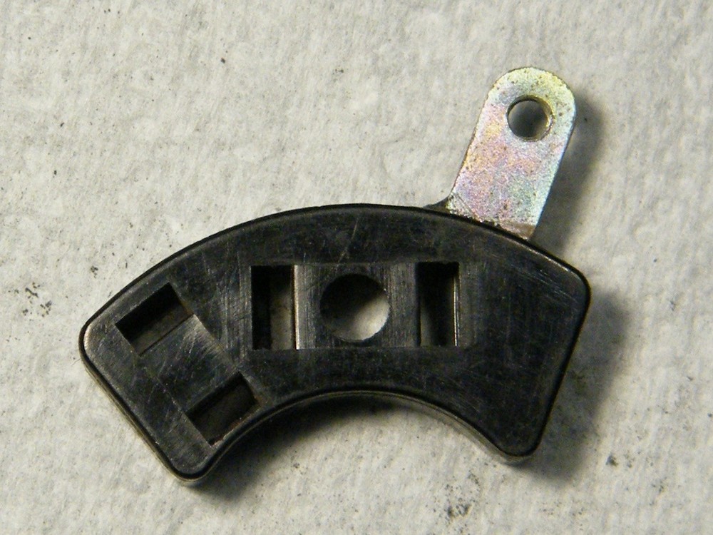 Suzuki GT750 headlight beam switch contact shuttle.