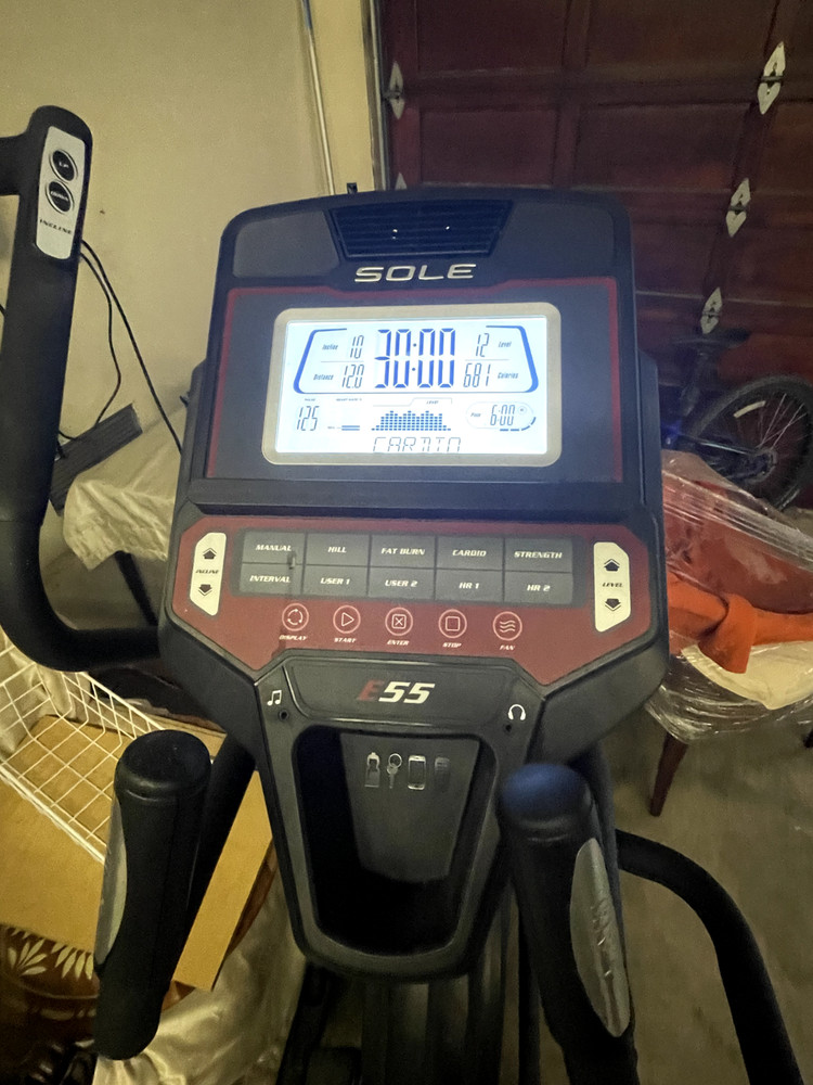 Used Sole E55 Standing Elliptical Machine