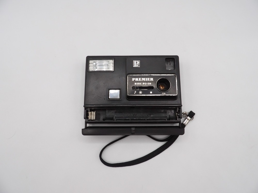 Vintage Premier PC-20 Motorized Disc Camera Point and Shoot Flash Untested