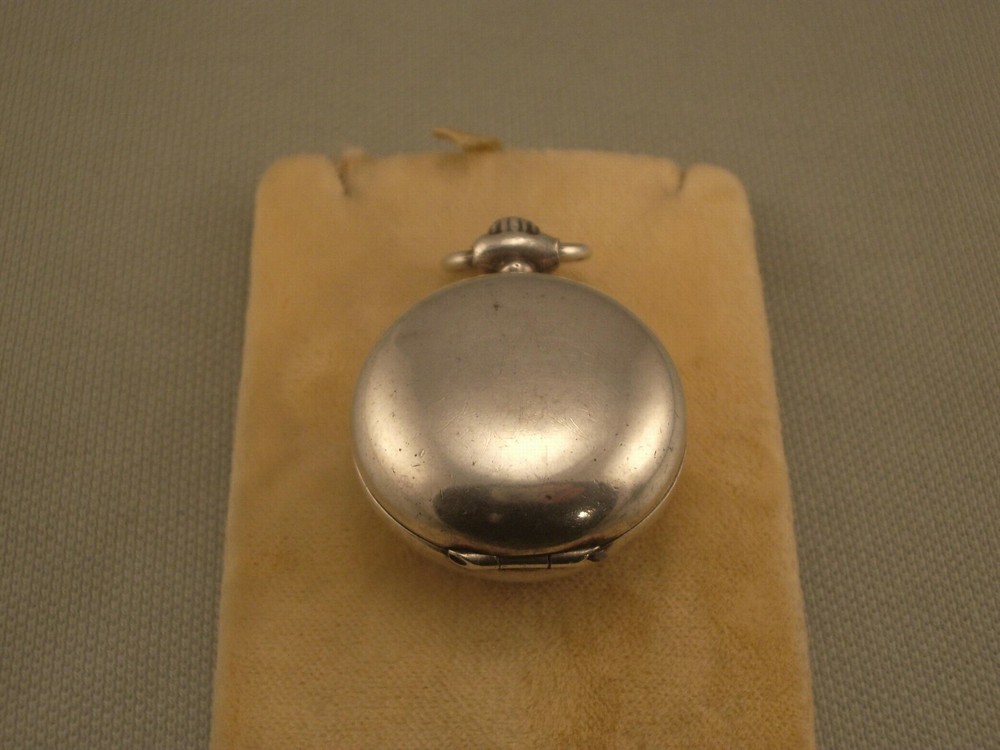 ANTIQUE SILVER COIN HOLDER