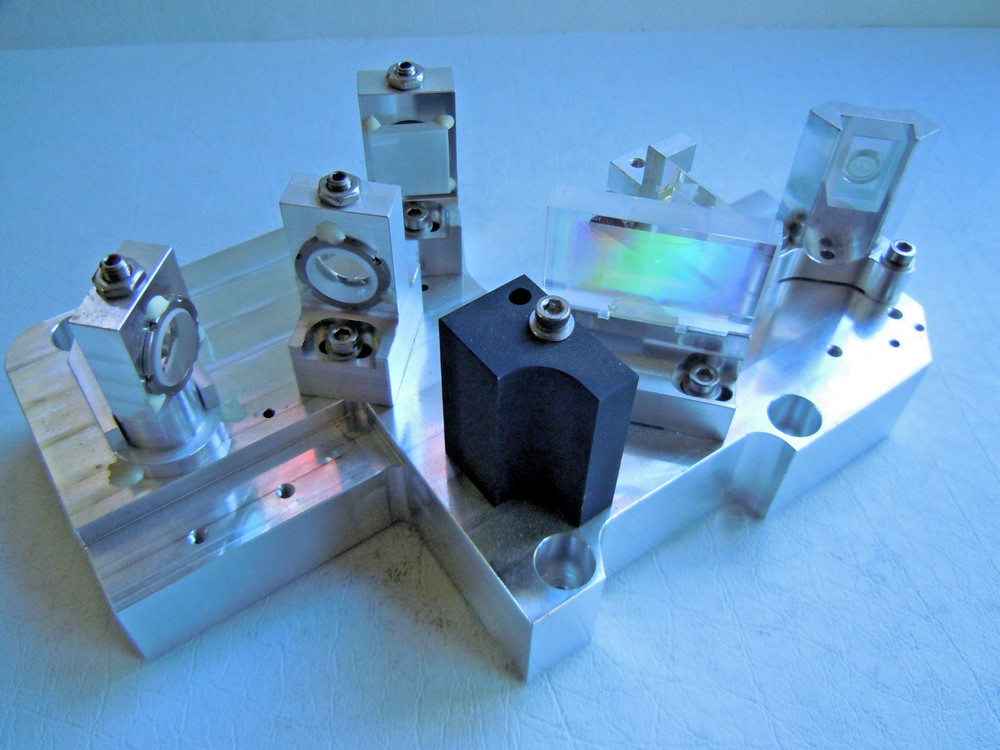 LASER MIRRORS REM0VED FROM BROKIN LASER.